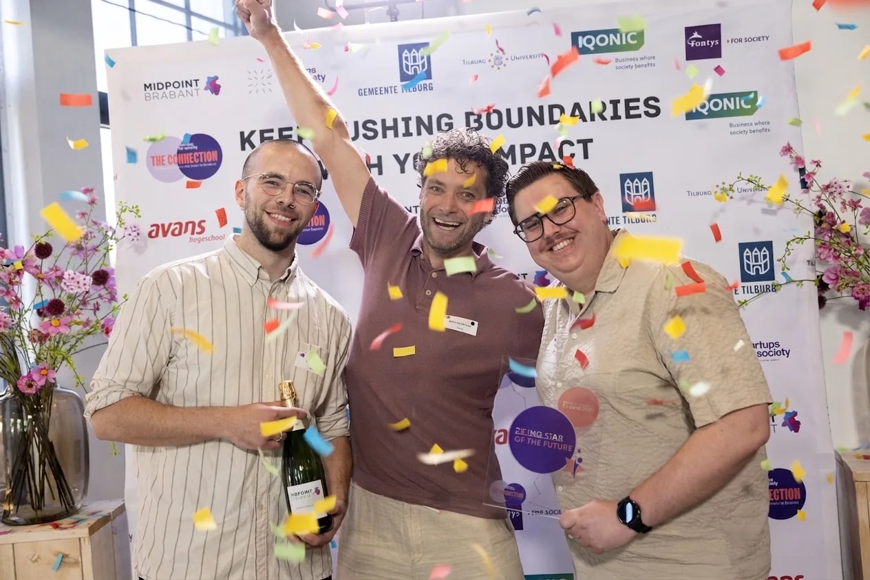 The Sainer team celebrating a win on stage